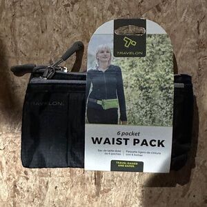 NWT Brand new, never used Travelon Black Waist Pack Bag with 6 pockets.
